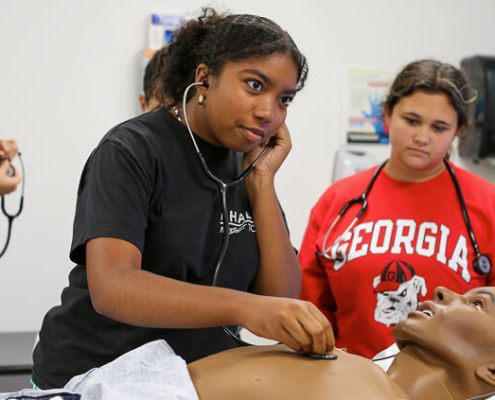Students at UGA mini medical scholl camp practiced medical simulations on mannequis during Summer Academy at UGA, facilitated by the UGA Center for Continuing Educaiton & Hotel. The AU/UGA Medical Partnership used half of its funding from the Sahm Award during summer 2022 to pay for three tennagers to attend the summer camp on the medi school campus in Athens (Photo: Shannah Montgomery/ PSO)