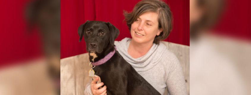 PAWS Director Lisa Milot with her pet, Indi. (Photo by Anne Yarbrough Photography)